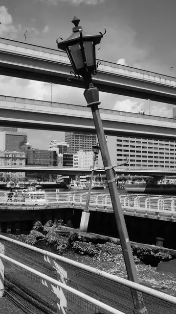 Leaning harbor lamp under the elevated highways