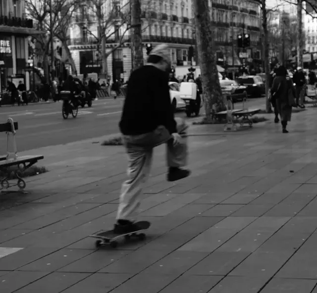Skater pushing on a boulevard