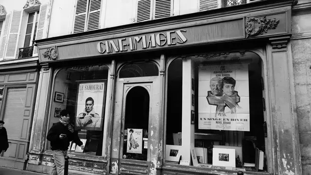 Ciné-Images shopfront with Le Samouraï and Belmondo posters