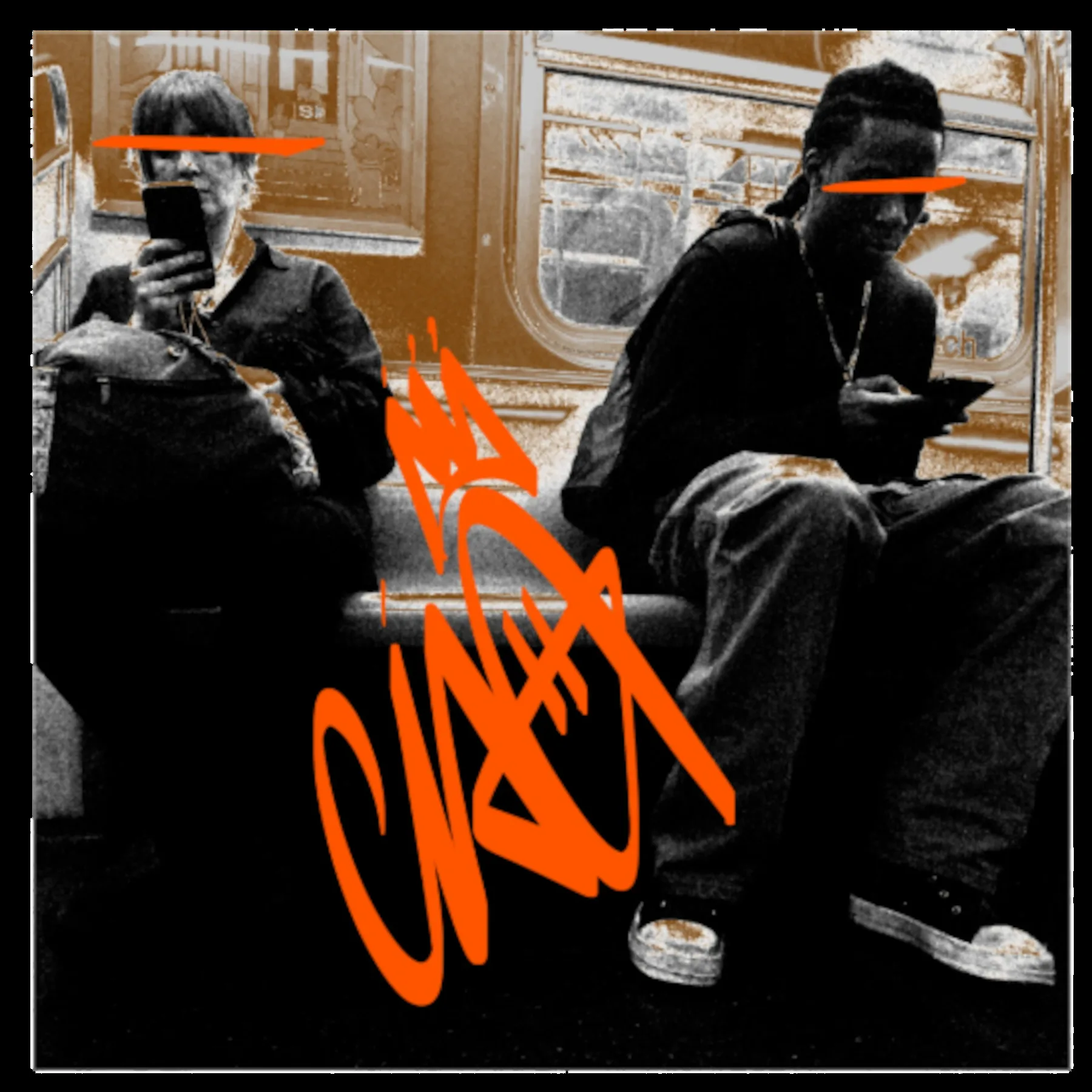 Subway riders rework with orange graffiti tag