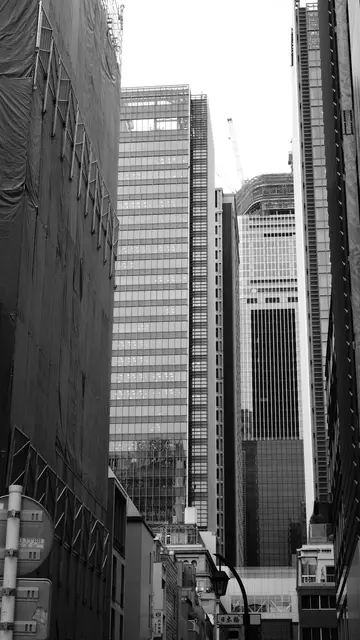 Canyon of glass towers above a Nihonbashi alley