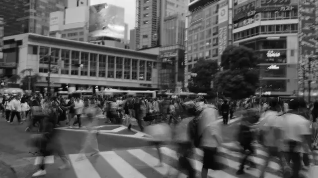 The scramble mid-crossing, everyone a ghost