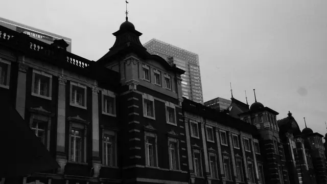 Tokyo Station brick facade against a glass tower